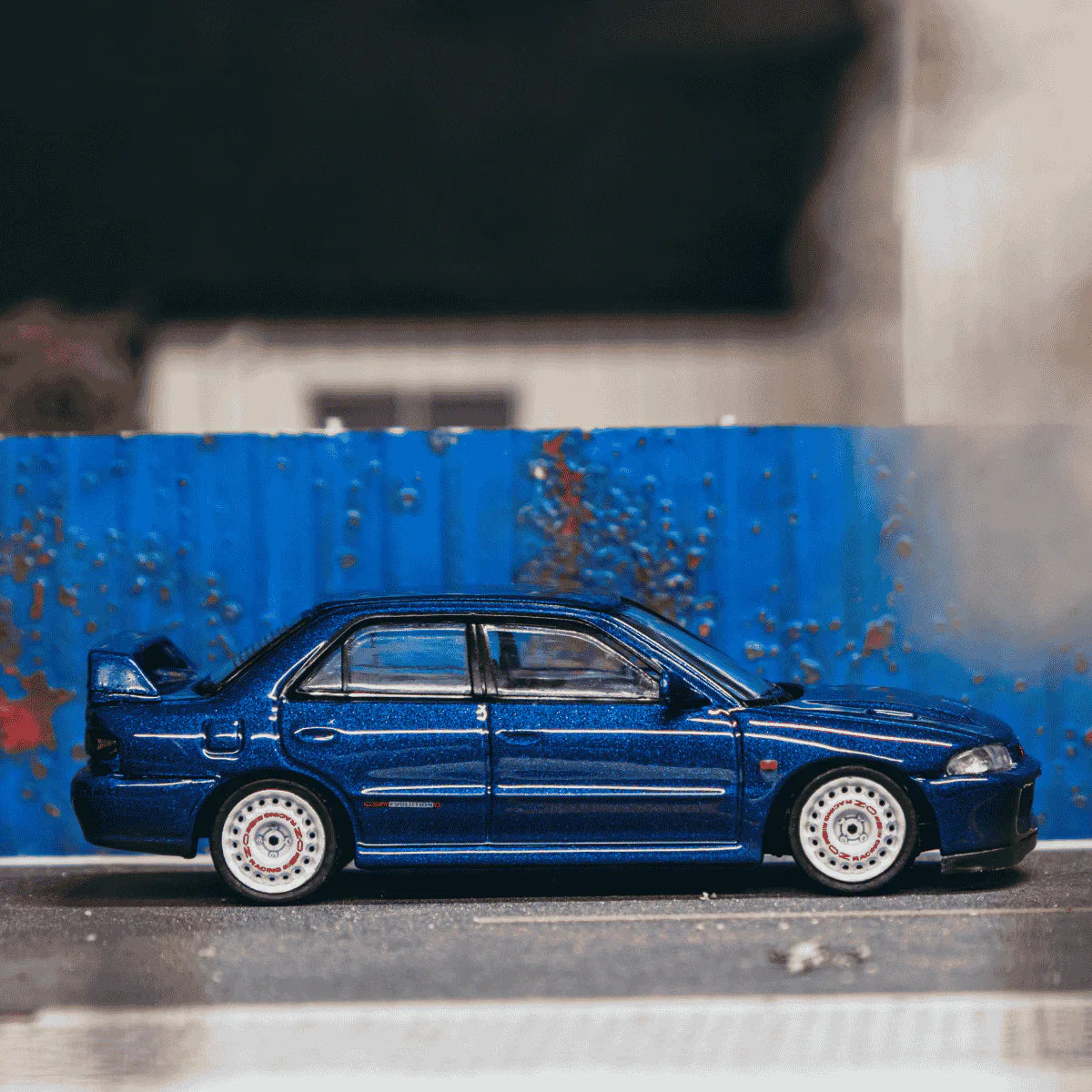 PRE-ORDER Tarmac Works Mitsubishi Lancer GSR Evolution II Chance of Chase Car, 1:64 Scale (Blue)