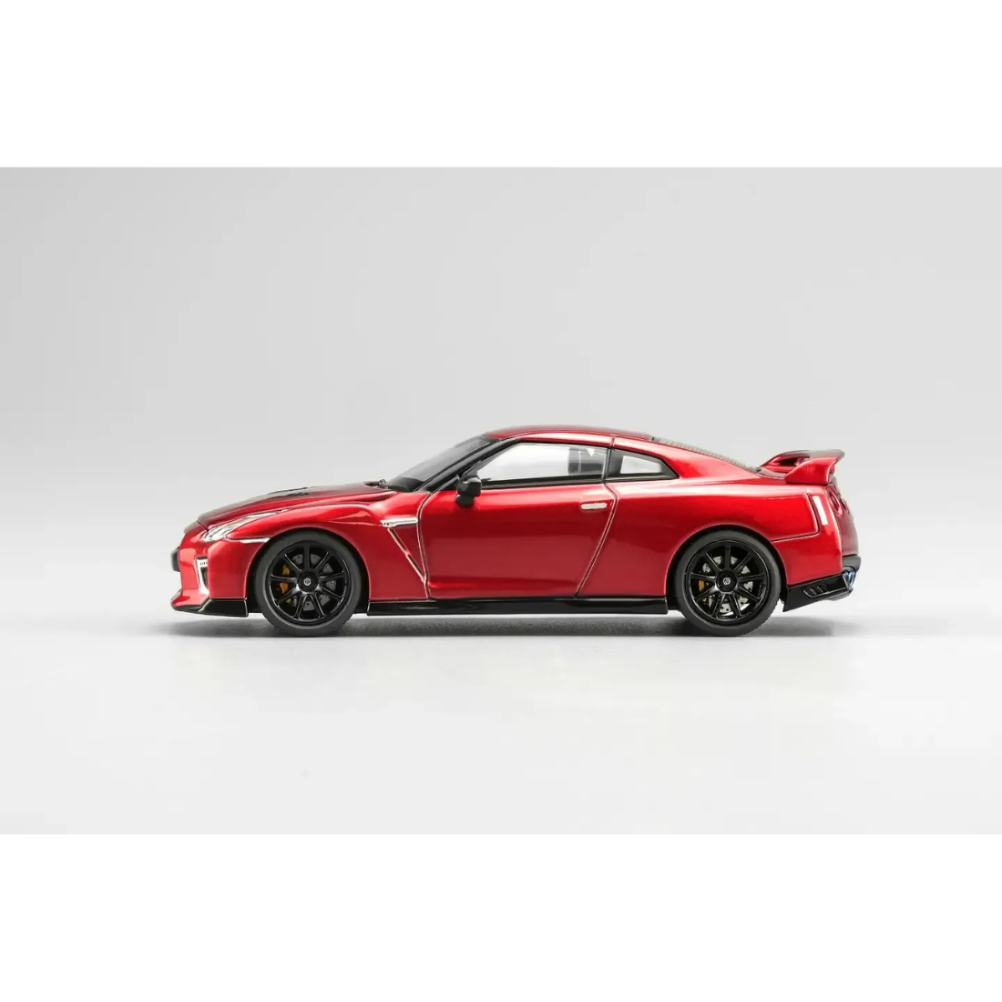 *HKTCS 2026* Nissan Skyline GT-R R34 Customized Red (Limited to 399pcs), 1:64 Scale - Motor Helix