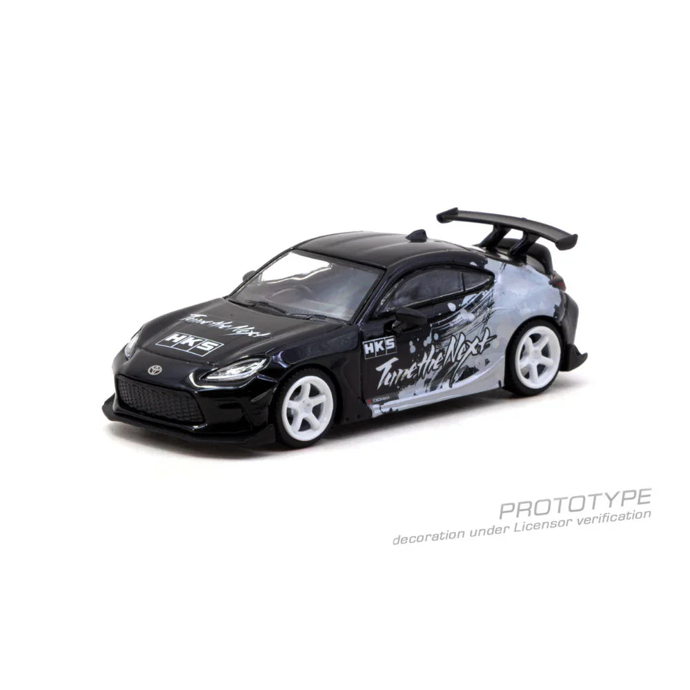PRE-ORDER Tarmac Works HKS Toyota GR86 Chance of Chase Car, 1:64 Scale (Black)