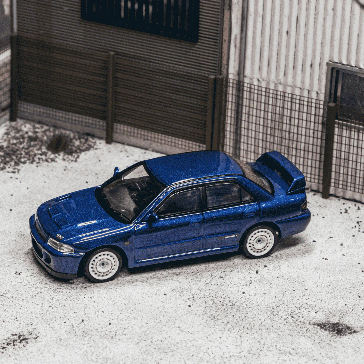 PRE-ORDER Tarmac Works Mitsubishi Lancer GSR Evolution II Chance of Chase Car, 1:64 Scale (Blue)