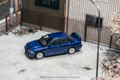PRE-ORDER Tarmac Works Mitsubishi Lancer GSR Evolution II Chance of Chase Car (Blister Pack), 1:64 Scale (Blue)