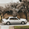 PRE-ORDER Tarmac Works Lexus LS400 (UCF10) Chance of Chase Car, 1:64 Scale (Pearl White)
