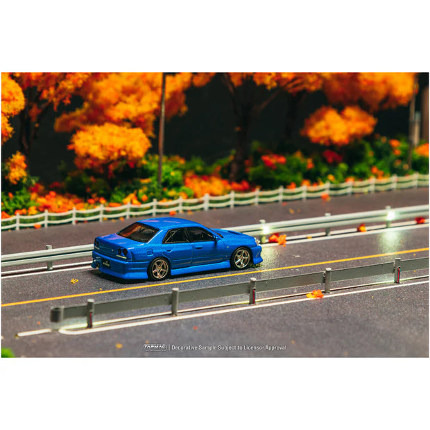 PRE-ORDER | URAS Skyline ER34 (Chance of Chase Car) 1:64 Scale (Blue) by Tarmac Works