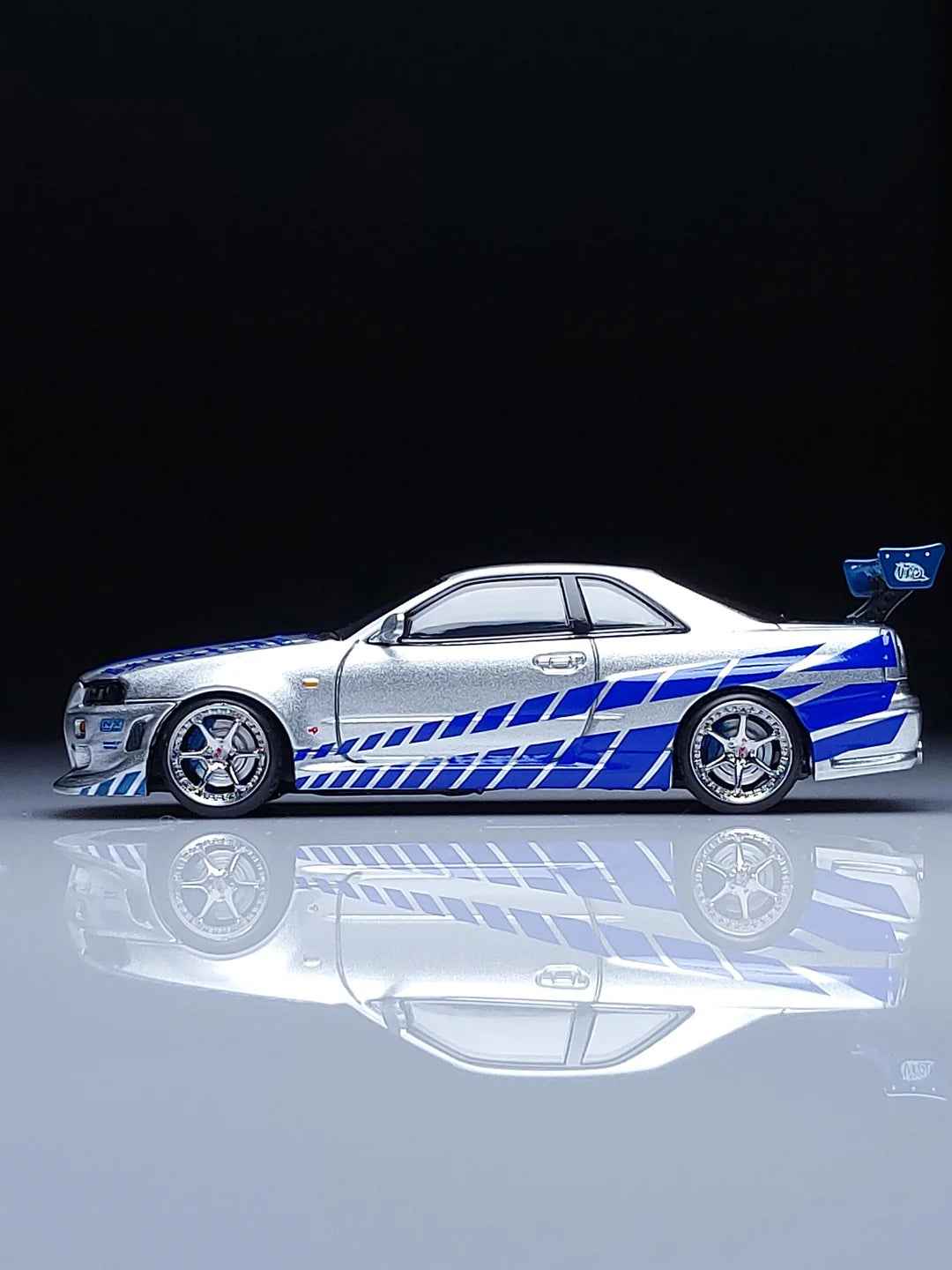 Nissan GTR R34 (Limited to 999pcs) Silver with Blue Lines, 1:64 Scale