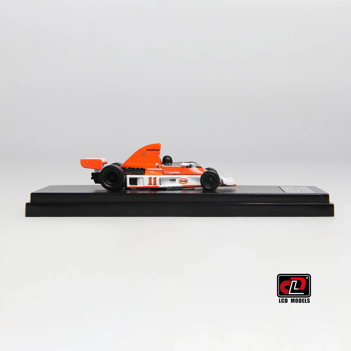 LCD McLaren M23 Orange with White 1:64 Scale Diecast Model